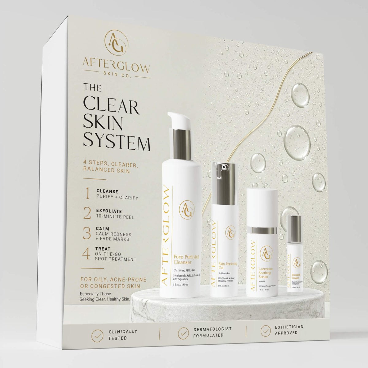 After Glow Skin Co. The Clear Skin System skincare set, featuring a white and gold retail box with four white cosmetic bottles displayed in front on a marble-like base against a light gray studio background.