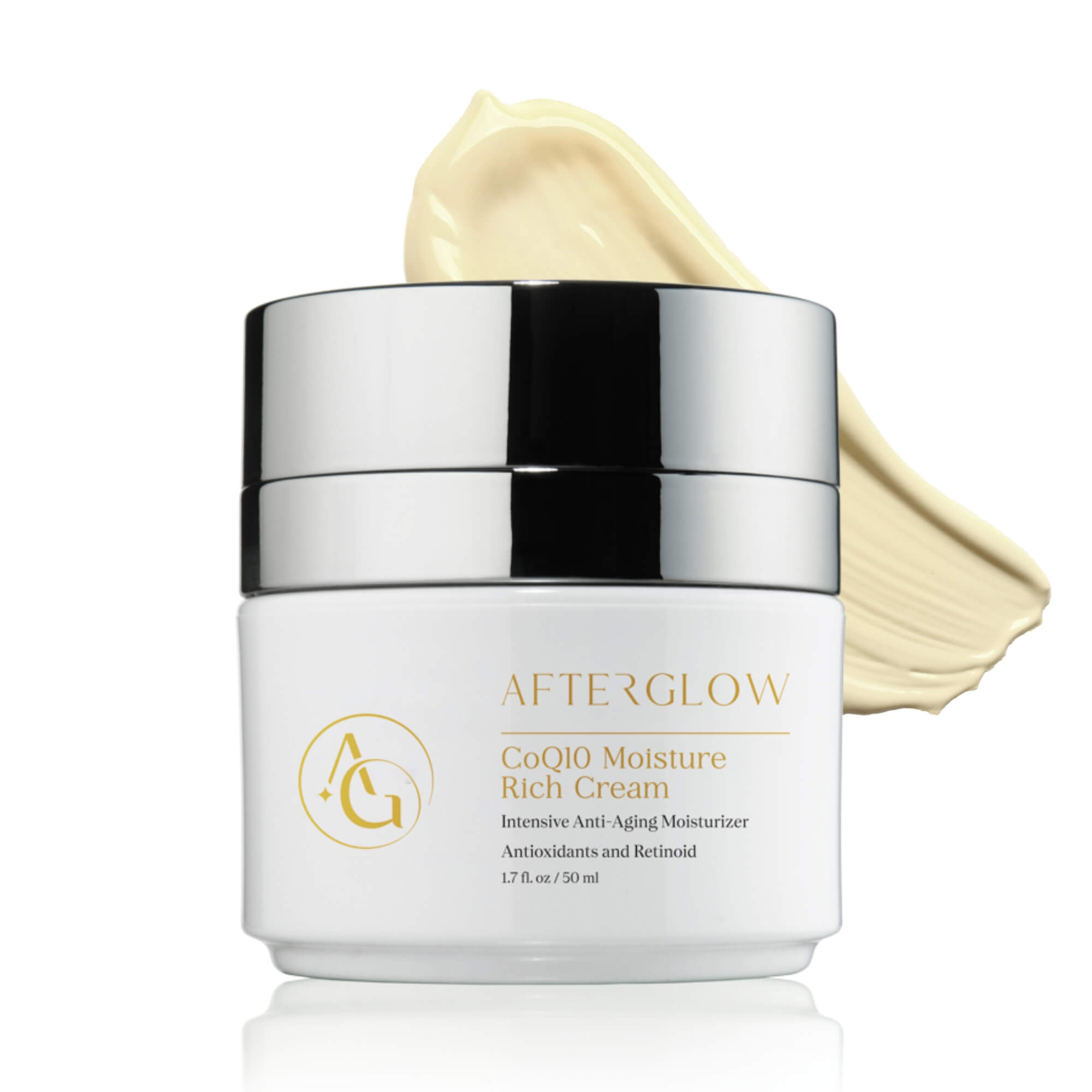 A branded skin product in a small tub called, 'afterglow coq10 moisture rich cream', laying on a yellow swatch of paint.