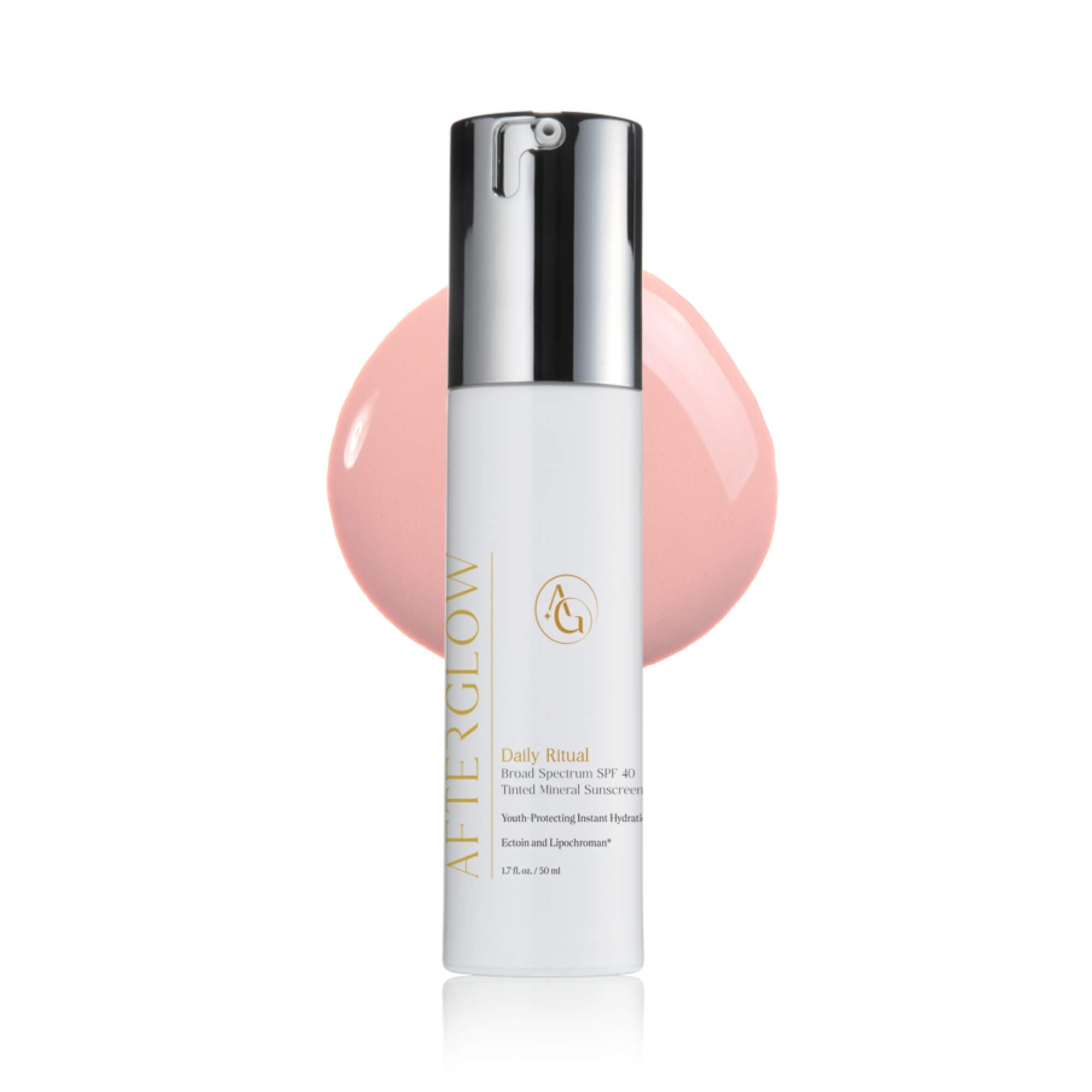 A small pump spray tube on top of a glob of pink paint with the writing, 'afterglow daily ritual' on it. With a white background.