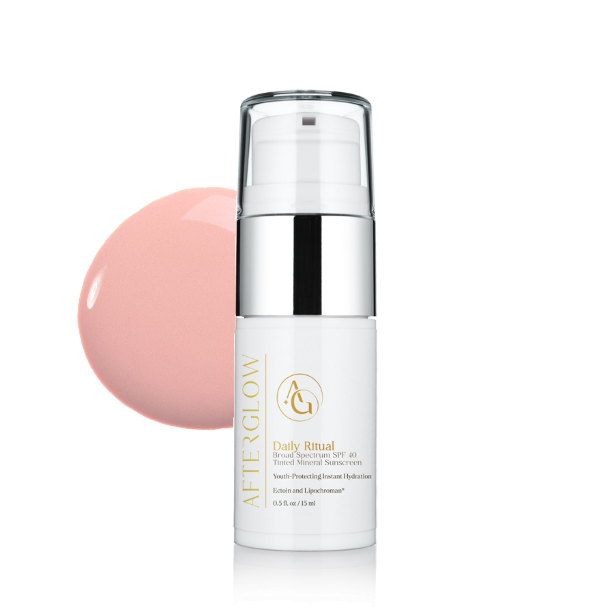 Afterglow Skin Co. Daily Ritual travel size in front of a drop of product on a white background