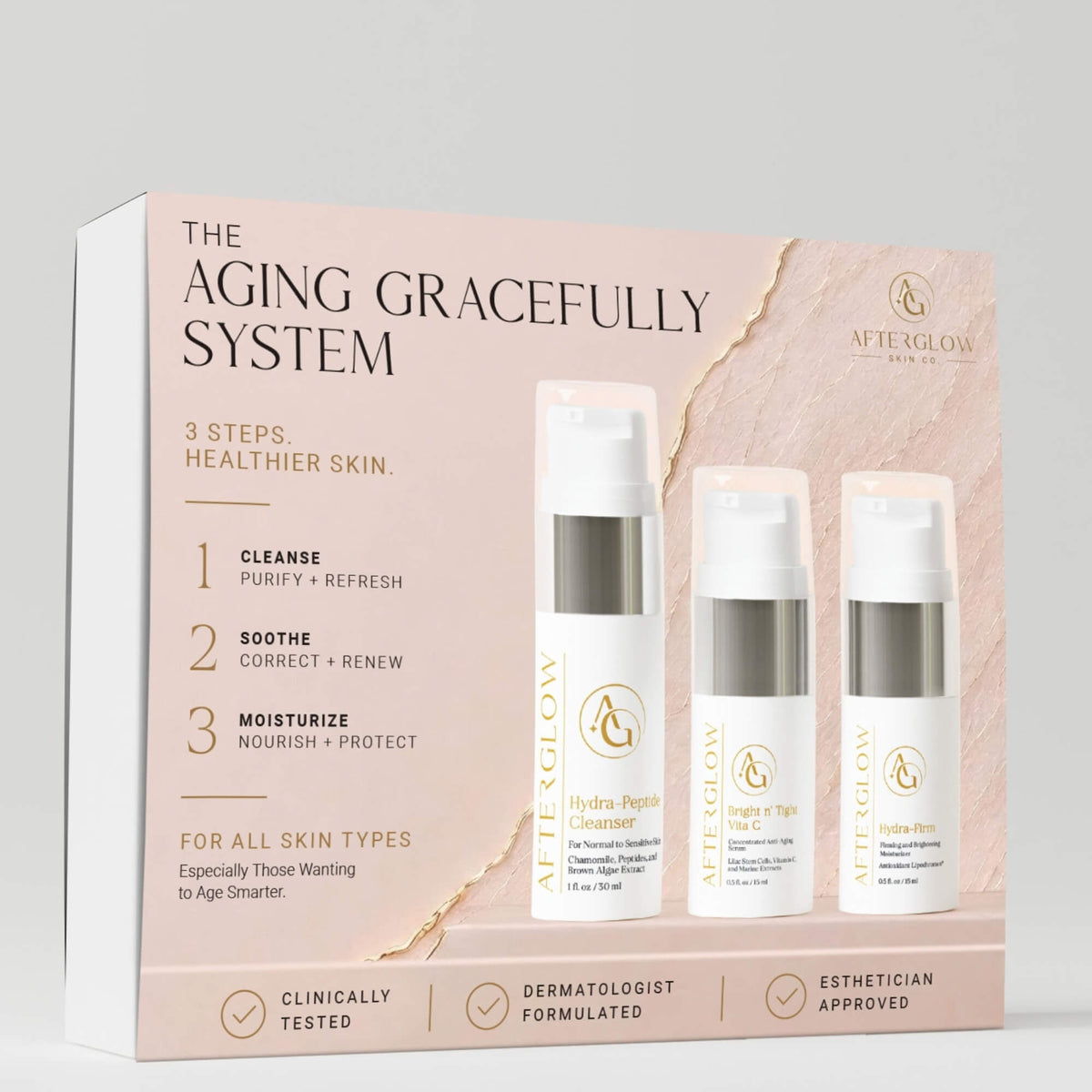 Afterglow Skin Co Aging gracefully travel system product packaging on a grey background.